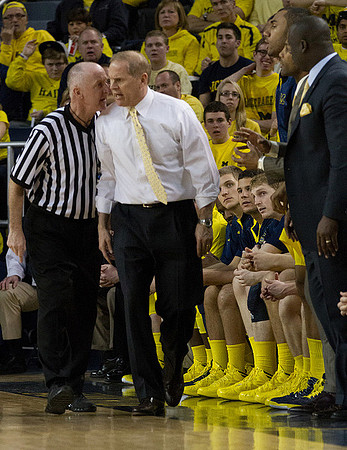 John Beilein, Max Bielfeldt (44), Josh Bartelstein (20), Blake McLimans (22),and Bacari Alexander
