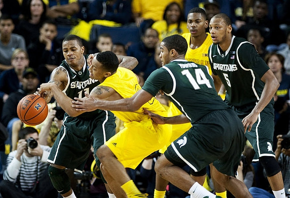 Trey Burke (3) and Glenn Robinson III (1)