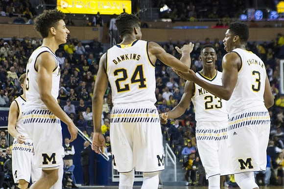 Spike Albrecht (2), D.J. Wilson (5), Aubrey Dawkins (24), Caris LeVert (23), and Kameron Chatman (3)