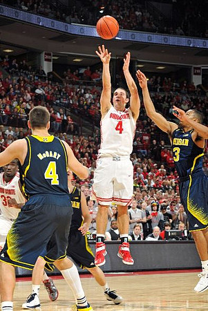 Mitch McGary (4), Spike Albrecht (2), and Trey Burke (3)
