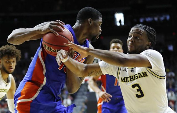 Isaiah Livers (4) and Zavier Simpson (3)