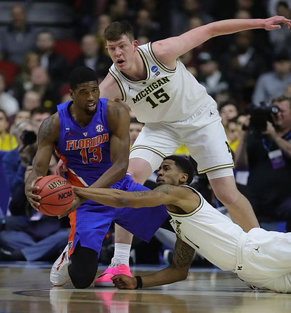 Charles Matthews (1) and Jon Teske (15)