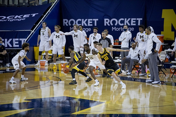 Mike Smith (12) and Chaundee Brown Jr. (15)