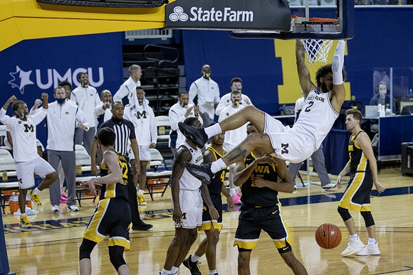 Isaiah Livers (2) and Chaundee Brown Jr. (15)