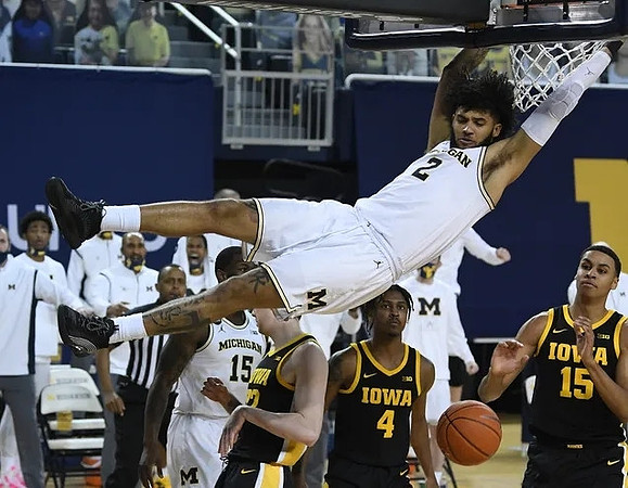 Isaiah Livers (2) and Chaundee Brown Jr. (15)