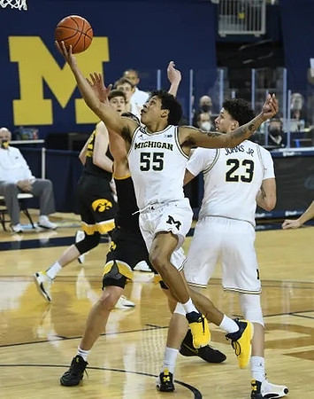 Eli Brooks (55) and Brandon Johns Jr. (23)