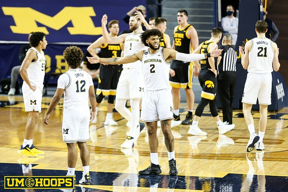 Eli Brooks (55), Mike Smith (12), Hunter Dickinson (1), Isaiah Livers (2), and Franz Wagner (21)