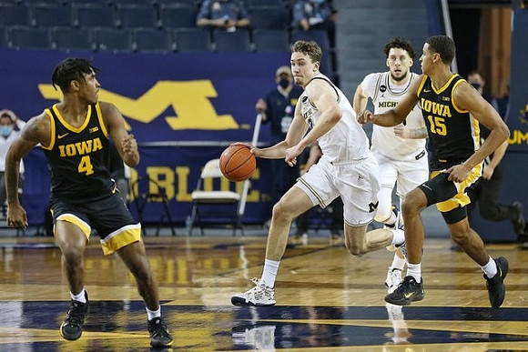 Franz Wagner (21) and Brandon Johns Jr. (23)