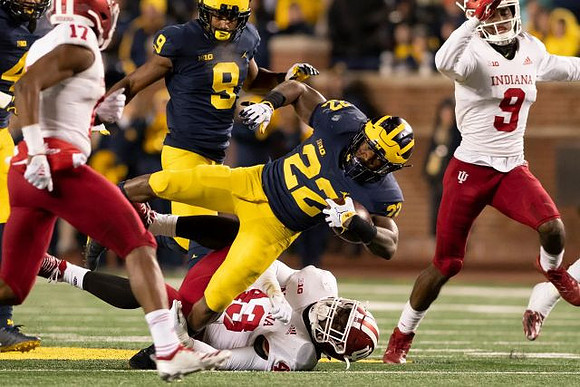 Donovan Peoples-Jones (9) and Karan Higdon (22)