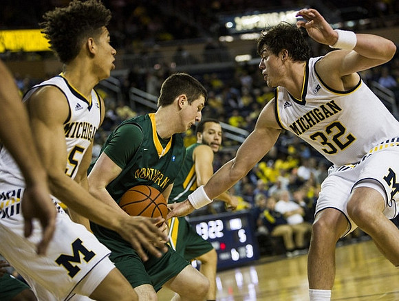 D.J. Wilson (5) and Ricky Doyle (32)