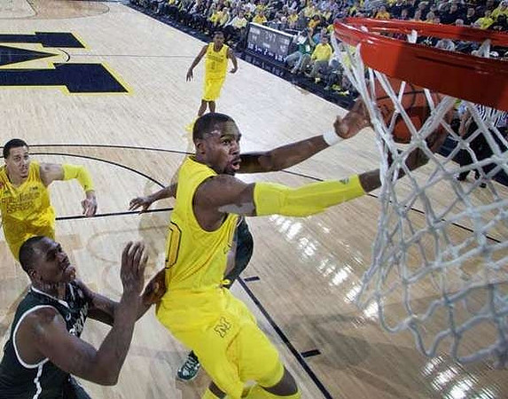 Tim Hardaway Jr. (10), Jordan Morgan (52), and Glenn Robinson III (1)