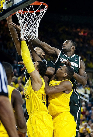 Jordan Morgan (52) and Glenn Robinson III (1)