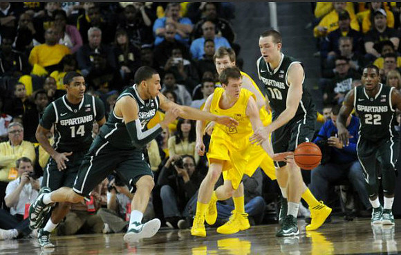 Spike Albrecht (2) and Matt Vogrich (13)