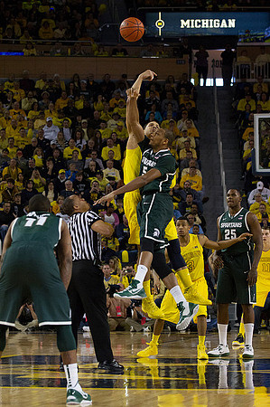Jordan Morgan (52), Trey Burke (3), and Nik Stauskas (11)