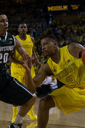 Glenn Robinson III (1) and Trey Burke (3)