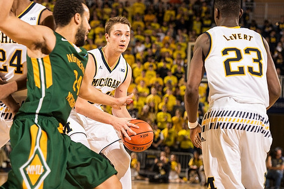 Aubrey Dawkins (24), Mark Donnal (34), and Caris LeVert (23)