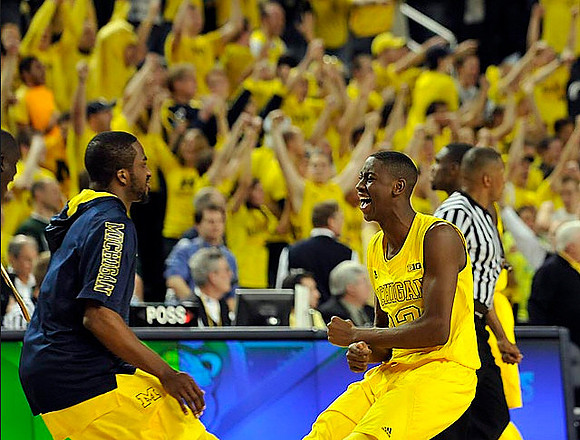 Corey Person (32), Caris LeVert (23), and Tim Hardaway Jr. (10)