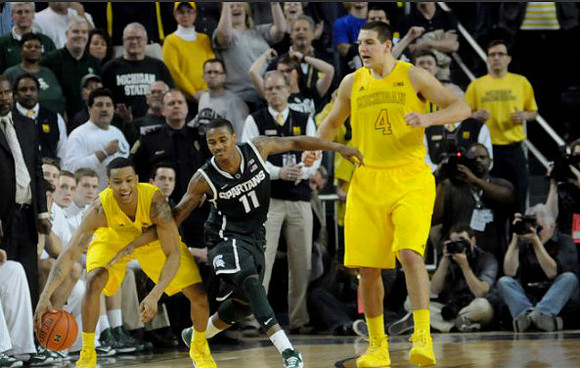 Trey Burke (3) and Mitch McGary (4)