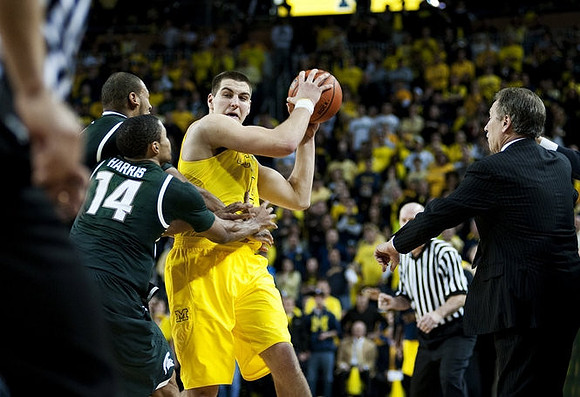 Mitch McGary (4) and Michigan State Head Coach Tom Izzo