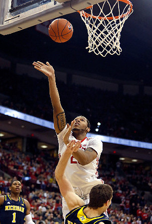 Glenn Robinson III (1) and Nik Stauskas (11)