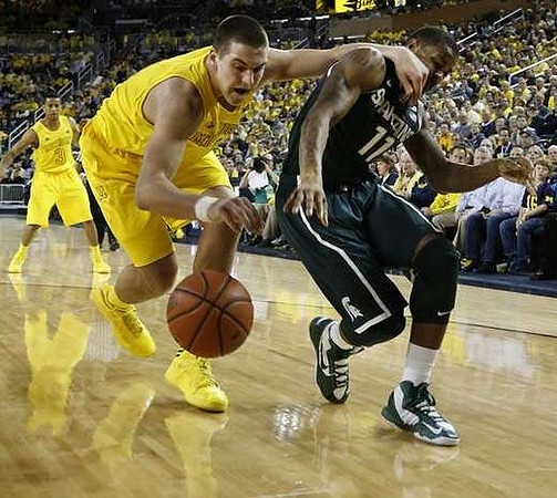 Mitch McGary (4) and Trey Burke (3)