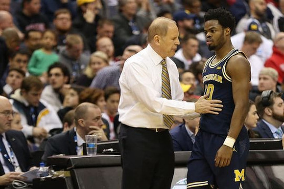 John Beilein and Derrick Walton Jr. (10)