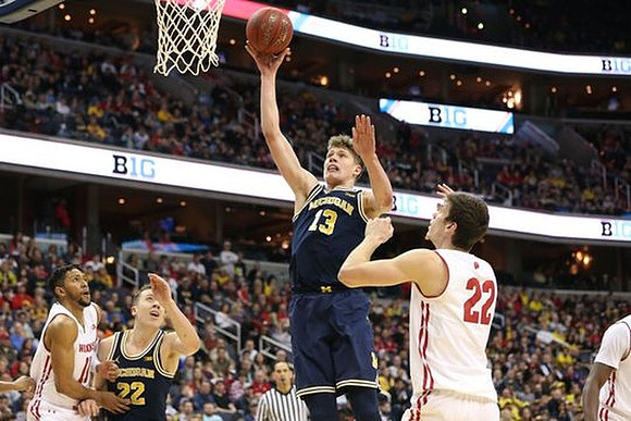Duncan Robinson (22) and Moritz Wagner (13)