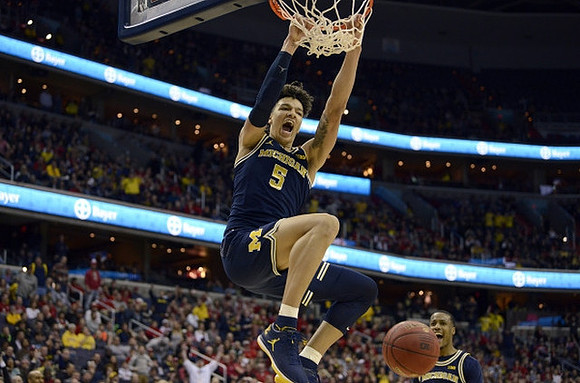 D.J. Wilson (5) and Muhammad-Ali Abdur-Rahkman (12)