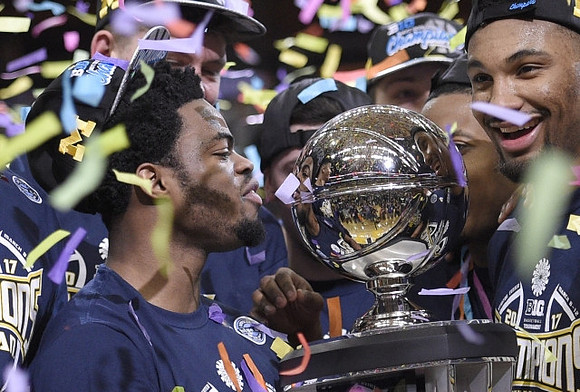Derrick Walton Jr. (10) and Zak Irvin (21)