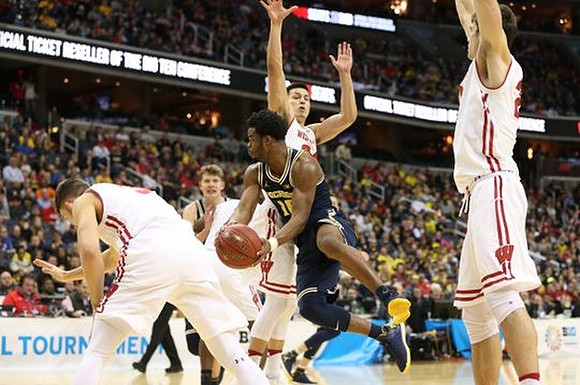 Derrick Walton Jr. (10) and Moritz Wagner (13)