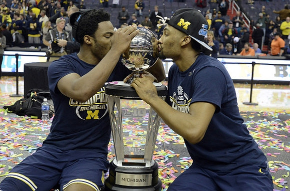Derrick Walton Jr. (10) and Zak Irvin (21)