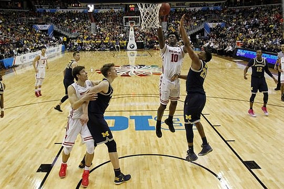 Duncan Robinson (22), Moritz Wagner (13), Zak Irvin (21), and Muhammad-Ali Abdur-Rahkman (12)
