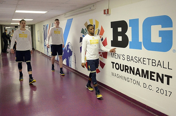 Mark Donnal (34), Jon Teske (15), and Xavier Simpson (3)