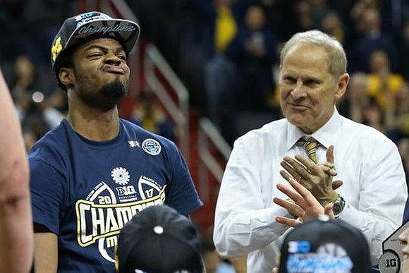 Derrick Walton Jr. (10) and John Beilein