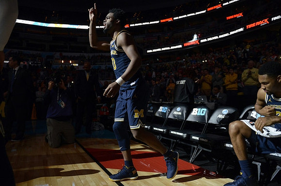 Derrick Walton Jr. (10) and Zak Irvin (21)