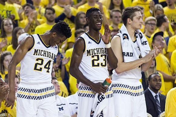 Aubrey Dawkins (24), Caris LeVert (23), and Mark Donnal (34)
