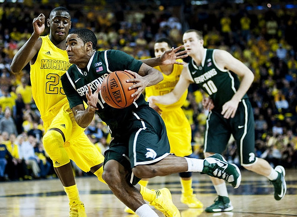 Caris LeVert (23) and Jordan Morgan (52)