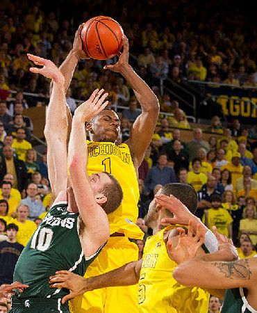 Glenn Robinson III (1) and Jon Horford (15)
