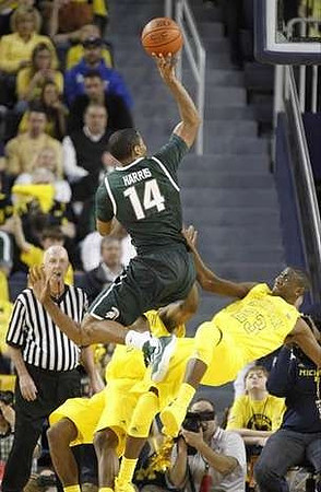 Glenn Robinson III (1) and Caris LeVert (23)
