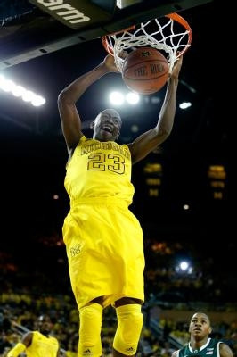 Caris LeVert (23) and Tim Hardaway Jr. (10)