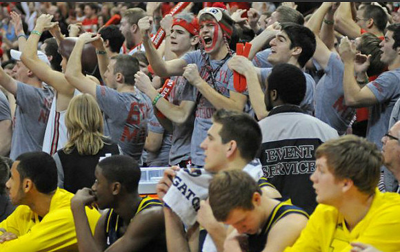 Jon Horford (15), Caris LeVert (23), Mitch McGary (4), Spike Albrecht (2), and Matt Vogrich (13)