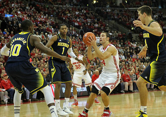 Tim Hardaway Jr. (10), Glenn Robinson III (1), and Mitch McGary (4)