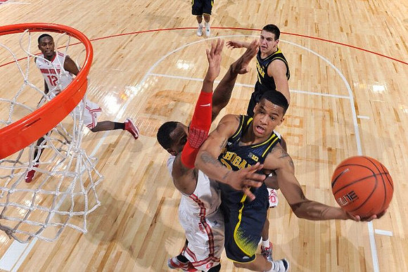 Trey Burke (3) and Mitch McGary (4)
