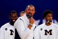 Chaundee Brown Jr. (15), Juwan Howard, and Jace Howard (25)