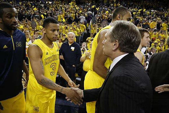 Corey Person (32), Trey Burke (3), Michigan State Head Coach Tom Izzo, Jon Horford (15), and Spike Albrecht (2)