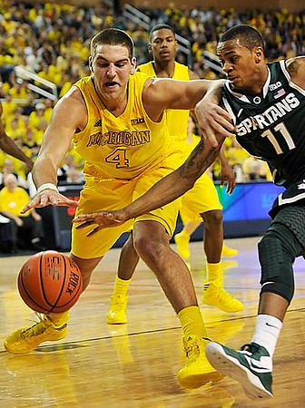 Mitch McGary (4) and Glenn Robinson III (1)