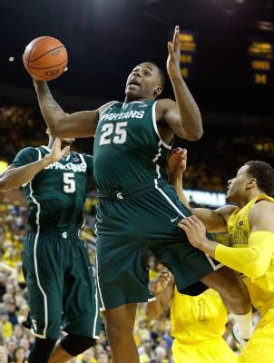 Jordan Morgan (52) and Glenn Robinson III (1)