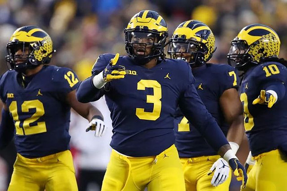 Josh Ross (12), Rashan Gary (3), Khaleke Hudson (7), and Devin Bush (10)