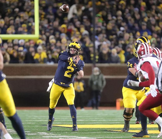 Shea Patterson (2) and Ben Bredeson (74)