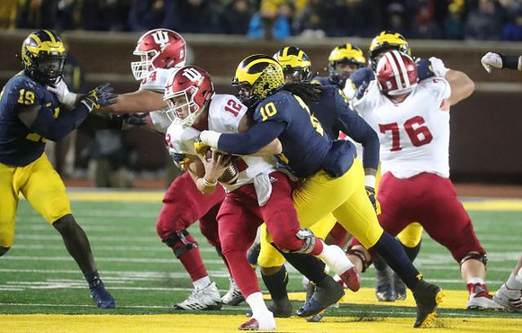 Kwity Paye (19), Devin Bush (10), and Rashan Gary (3)